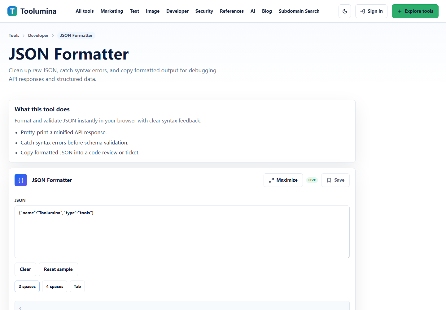Toolumina JSON Formatter page showing a raw JSON input area and formatting controls